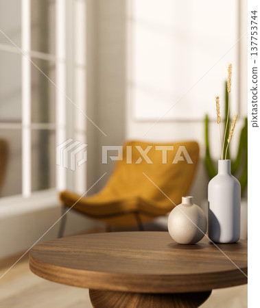 Flower vases on round wooden table across a mustard accent chair with sunlight through glass window. Flower vases on round wooden table across a mustard accent chair with sunlight through glass window. 137753744