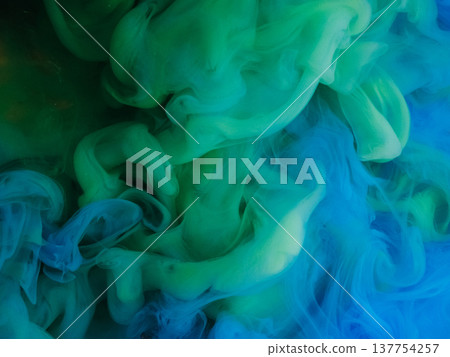 Fume ink. Paint fog drop. Blur green blue colorful cloud smoke splash vapor vibrant water texture spreading on abstract background. Fume ink. Paint fog drop. Blur green blue colorful cloud smoke splash vapor vibrant water texture spreading on abstract background. 137754257