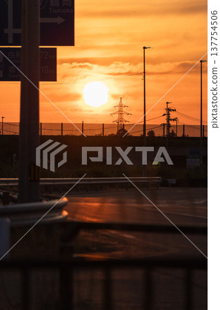 [Evening view of Shonai] Pedestrian overpass and sunset 137754506