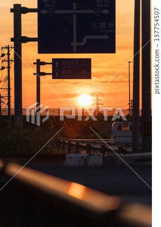 [Evening view of Shonai] Sunset over the highway 137754507