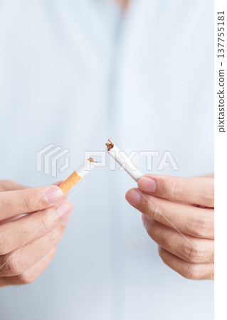 Man hand break cigarette for World No Tobacco Day concept, quitting smoking to prevent Lung Cancer, COPD, Emphysema and Tuberculosis disease. healthy lifestyle resolution, stop nicotine addiction Man hand break cigarette for World No Tobacco Day concept, quitting smoking to prevent Lung Cancer, COPD, Emphysema and Tuberculosis disease. healthy lifestyle resolution, stop nicotine addiction 137755181