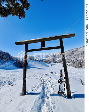 A torii gate in the snow at the Hikage ski slope in Nozawa Onsen. A torii gate in the snow at the Hikage ski slope in Nozawa Onsen. 137755961