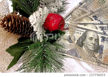Christmas Cash and Holiday Decorations. $100 dollar bills with festive ornaments. Perfect for holiday budget, bonus, and shopping concepts. Christmas Cash and Holiday Decorations. $100 dollar bills with festive ornaments. Perfect for holiday budget, bonus, and shopping concepts. 137756053