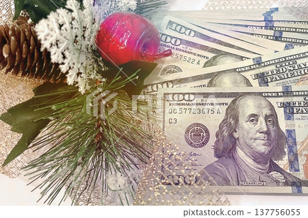 Christmas Cash and Holiday Decorations. $100 dollar bills with festive ornaments. Perfect for holiday budget, bonus, and shopping concepts. Christmas Cash and Holiday Decorations. $100 dollar bills with festive ornaments. Perfect for holiday budget, bonus, and shopping concepts. 137756055