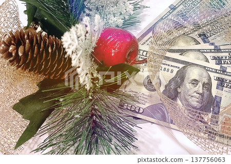 Christmas Cash and Holiday Decorations. $100 dollar bills with festive ornaments. Perfect for holiday budget, bonus, and shopping concepts. 137756063
