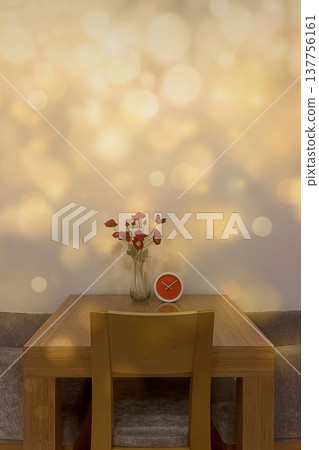 A warm interior with red poppies and an orange clock. A warm, minimalist look featuring flowers and a modern clock against a gold bokeh background. Perfect for lifestyle decor. 137756161