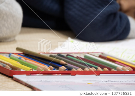 A child who fell asleep in the middle of coloring A child who fell asleep in the middle of coloring 137756521