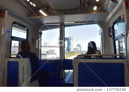 Inside and outside the train of the Yurikamome New Transit Line in Tokyo Inside and outside the train of the Yurikamome New Transit Line in Tokyo 137756586