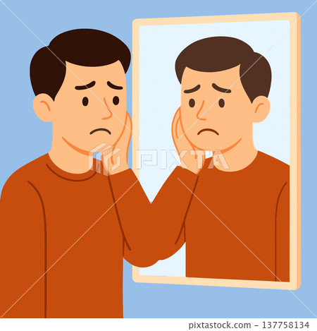 Sad man looking at himself in mirror 137758134