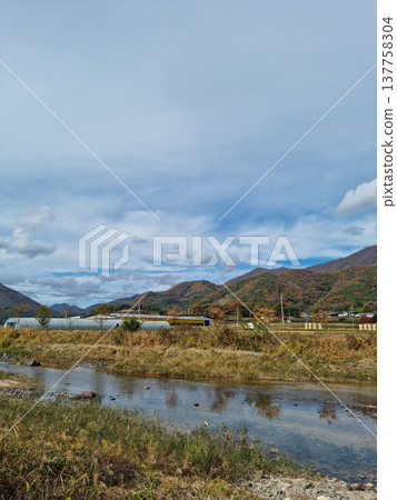 Autumn rural landscape with a river Autumn rural landscape with a river 137758304