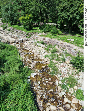This is a valley landscape with rocks.	 137758432