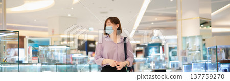 asian business woman shopping at mall during sale and discount with wear protective mask asian business woman shopping at mall during sale and discount with wear protective mask 137759270