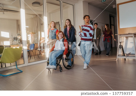 Teen students in school hallway, girl in wheelchair. 137759357