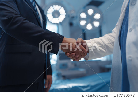 Hospital business handshake in medical environment 137759578