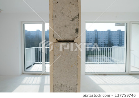 Empty doorway in unfinished apartment during home renovation. 137759746