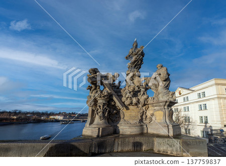 24 Feb 2026,Prague, Czech Republic. Baroque statues on the historic Charles Bridge with tourists walking across Vltava River against a beautiful cloudy sky 24 Feb 2026,Prague, Czech Republic. Baroque statues on the historic Charles Bridge with tourists walking across Vltava River against a beautiful cloudy sky 137759837