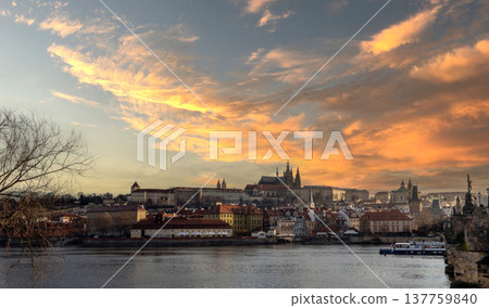 24 Feb 2026, Prague,Czech Republic. Stunning sunset view of Prague Castle and Vltava River in Prague, Czech Republic. Beautiful golden sky over the historic European city skyline at dusk 24 Feb 2026, Prague,Czech Republic. Stunning sunset view of Prague Castle and Vltava River in Prague, Czech Republic. Beautiful golden sky over the historic European city skyline at dusk 137759840
