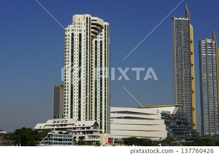 High-rise buildings along the Chao Phraya River in Bangkok, Thailand 137760426