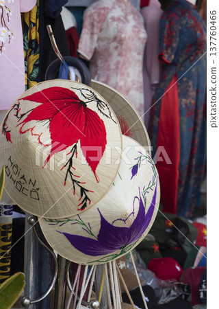 Decorated Vietnamese conical hats at souvenir shop in Hoi An old town Decorated Vietnamese conical hats at souvenir shop in Hoi An old town 137760466