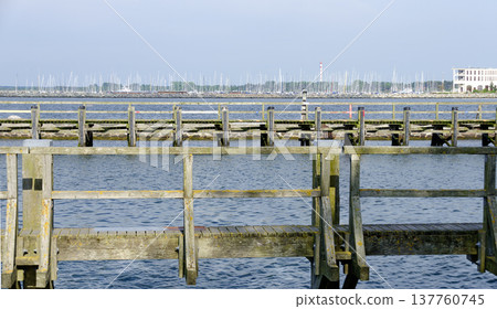 wooden jetties in the harbour of Warnemuende wooden jetties in the harbour of Warnemuende 137760745