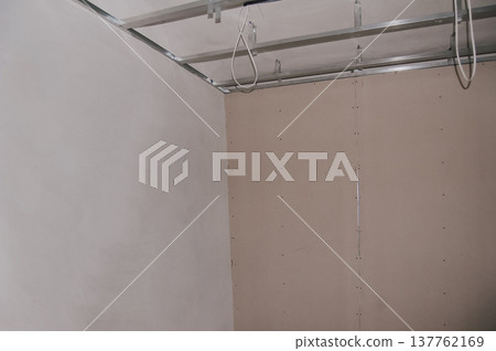 Corner of the room covered with drywall. Corner of the room covered with drywall. 137762169