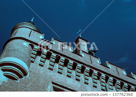 red brick building with blue sky red brick building with blue sky 137762368