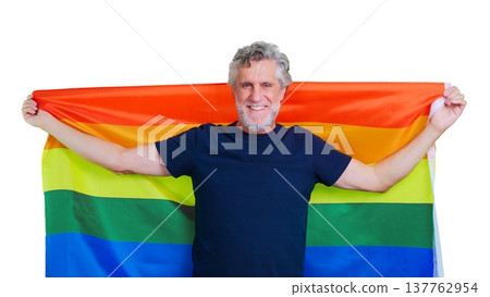 Senior man smiling holding rainbow pride flag 137762954