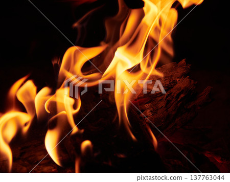 The shape of a flame burning fiercely in the dark night The shape of a flame burning fiercely in the dark night 137763044