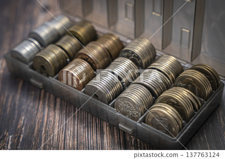 Coins in a case, Japanese yen piggy bank Coins in a case, Japanese yen piggy bank 137763124