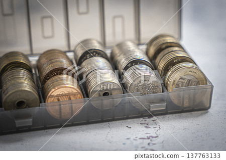Coins in a case, Japanese yen piggy bank Coins in a case, Japanese yen piggy bank 137763133