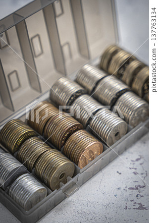 Coins in a case, Japanese yen piggy bank Coins in a case, Japanese yen piggy bank 137763134