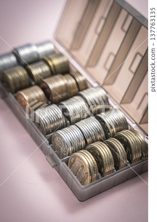 Coins in a case, Japanese yen piggy bank 137763135