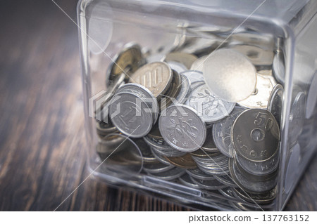 Coins in a case, Japanese yen piggy bank Coins in a case, Japanese yen piggy bank 137763152