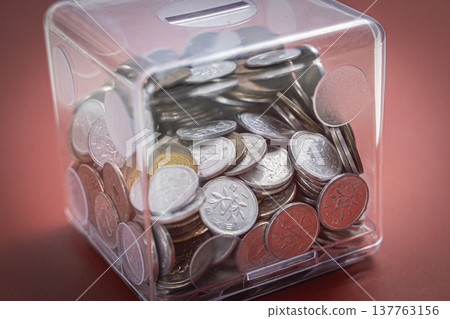 Coins in a case, Japanese yen piggy bank Coins in a case, Japanese yen piggy bank 137763156