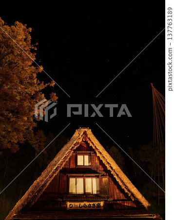 A wintertime view of Gero Gassho Village, a popular tourist spot in Gifu Prefecture, Japan, featuring the night sky and stars. A wintertime view of Gero Gassho Village, a popular tourist spot in Gifu Prefecture, Japan, featuring the night sky and stars. 137763189