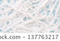 Close up pile of white dental floss picks, oral hygiene plastic tools texture background 137763217