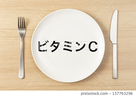 A plate and cutlery labeled "Vitamin C" A plate and cutlery labeled "Vitamin C" 137763296