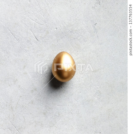 Minimal Luxury Easter Concept with Single Golden Egg Minimal Luxury Easter Concept with Single Golden Egg 137763554