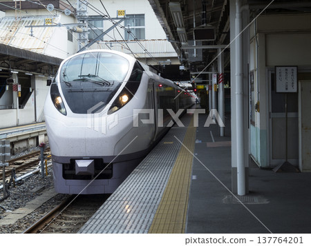 A limited express train stopped at the Joban Line platform at Ueno Station. A limited express train stopped at the Joban Line platform at Ueno Station. 137764201