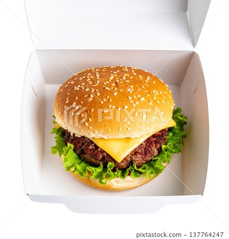 A delicious cheeseburger with juicy beef, fresh lettuce, and tomato on a sesame bun, placed against a white background. A delicious cheeseburger with juicy beef, fresh lettuce, and tomato on a sesame bun, placed against a white background. 137764247