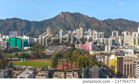 KOWLOON CITY, HONG KONG. Urban roadway linking residential neighborhoods March 14 2026 KOWLOON CITY, HONG KONG. Urban roadway linking residential neighborhoods March 14 2026 137764773