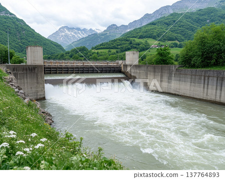 dam releasing water into river, surrounded by lush greenery and mountains, creates serene yet powerful scene dam releasing water into river, surrounded by lush greenery and mountains, creates serene yet powerful scene 137764893