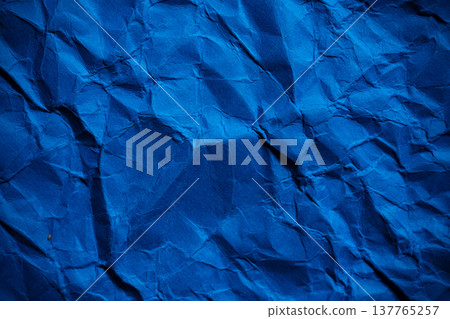 Wrinkled blue paper background Wrinkled blue paper background 137765257