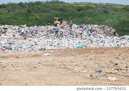 Municipal garbage dump at landfill. Environmental pollution. Municipal garbage dump at landfill. Environmental pollution. 137765632