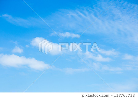beautiful blue sky with clouds background 137765738
