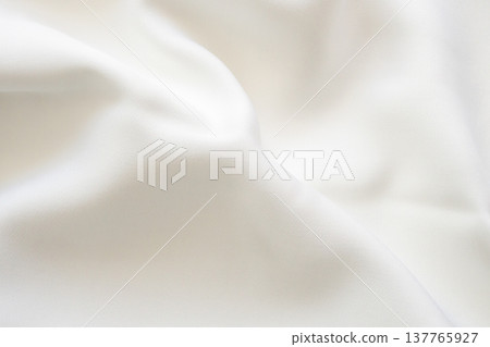 Abstract white fabric soft wave smooth texture surface background Abstract white fabric soft wave smooth texture surface background 137765927