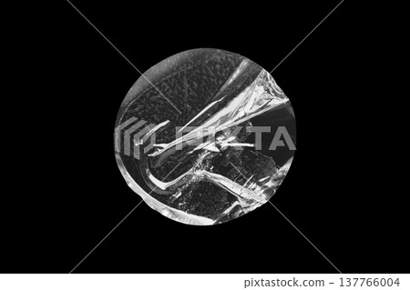 transparent adhesive round plastic sticker label isolated on black background transparent adhesive round plastic sticker label isolated on black background 137766004