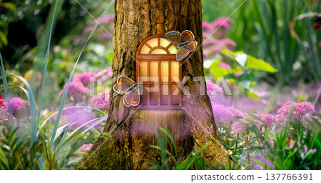 Fantasy fairy tale forest with magical shining window of enchanted house in hollow of pine tree 137766391