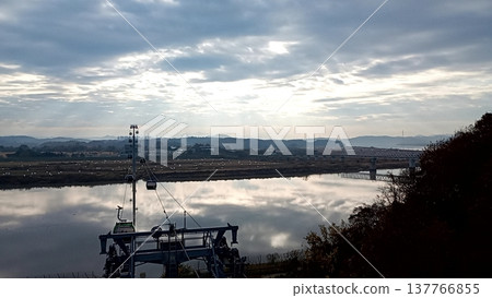 A cable car and river scenery in the DMZ (Demilitarized Zone) of South Korea. A cable car and river scenery in the DMZ (Demilitarized Zone) of South Korea. 137766855