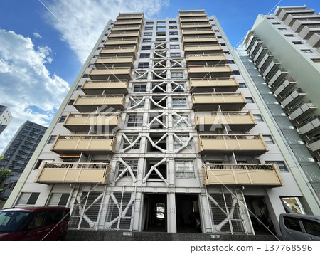 Old apartment buildings with seismic bracing installed Old apartment buildings with seismic bracing installed 137768596